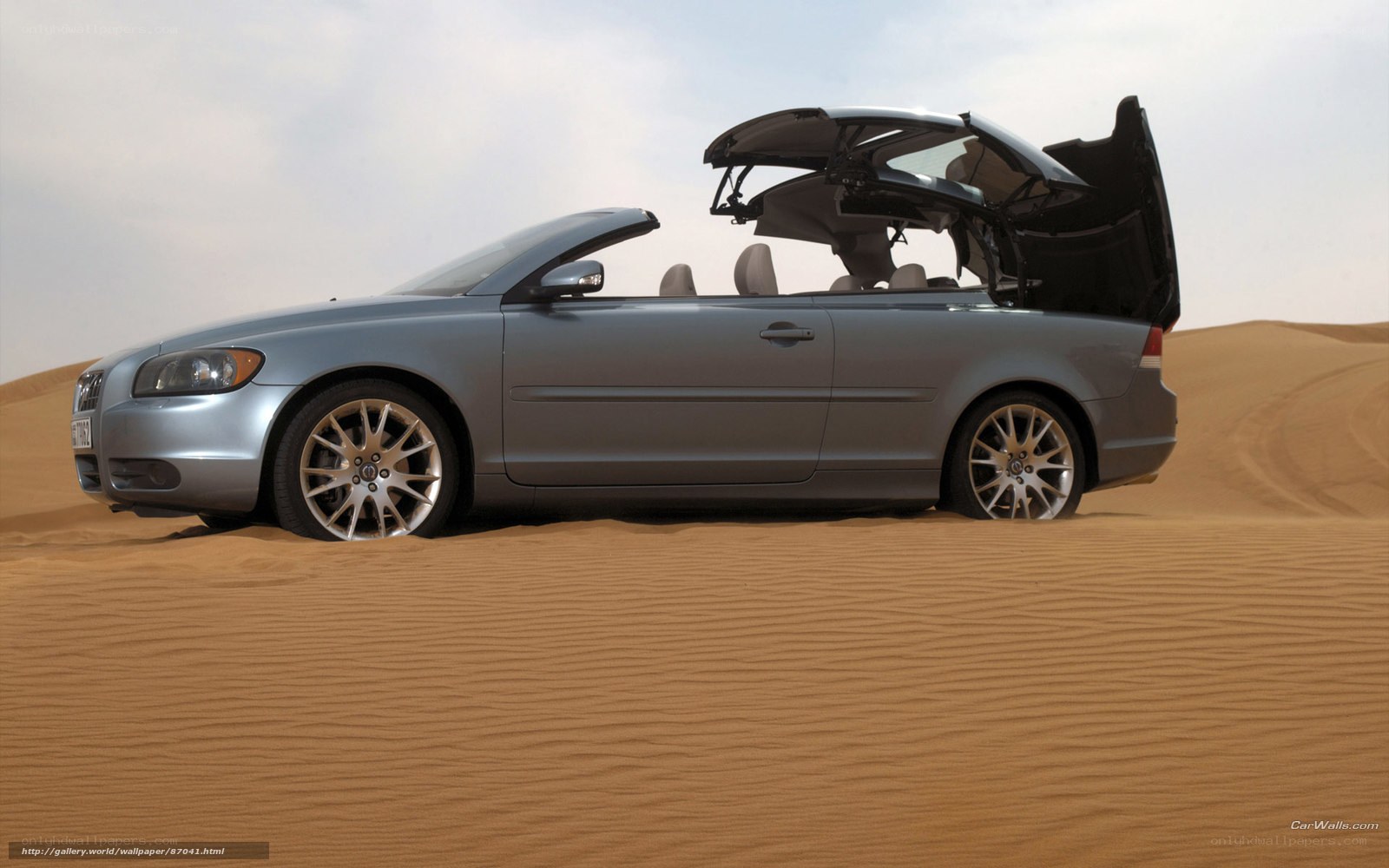 silver convertible in desert