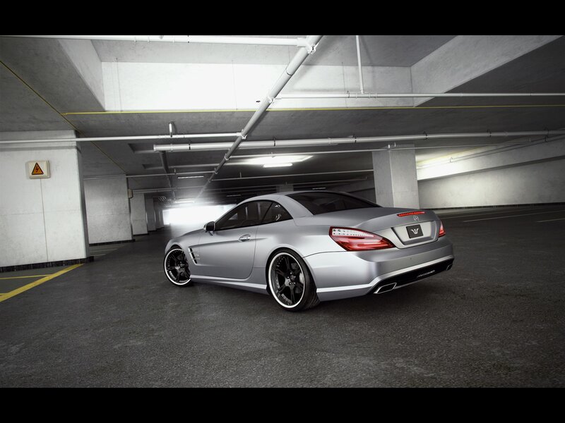 Silver convertible in parking garage