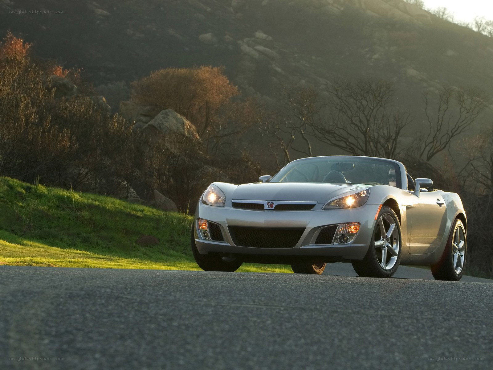 silver convertible on a road