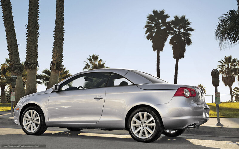 Silver convertible on a sunny day