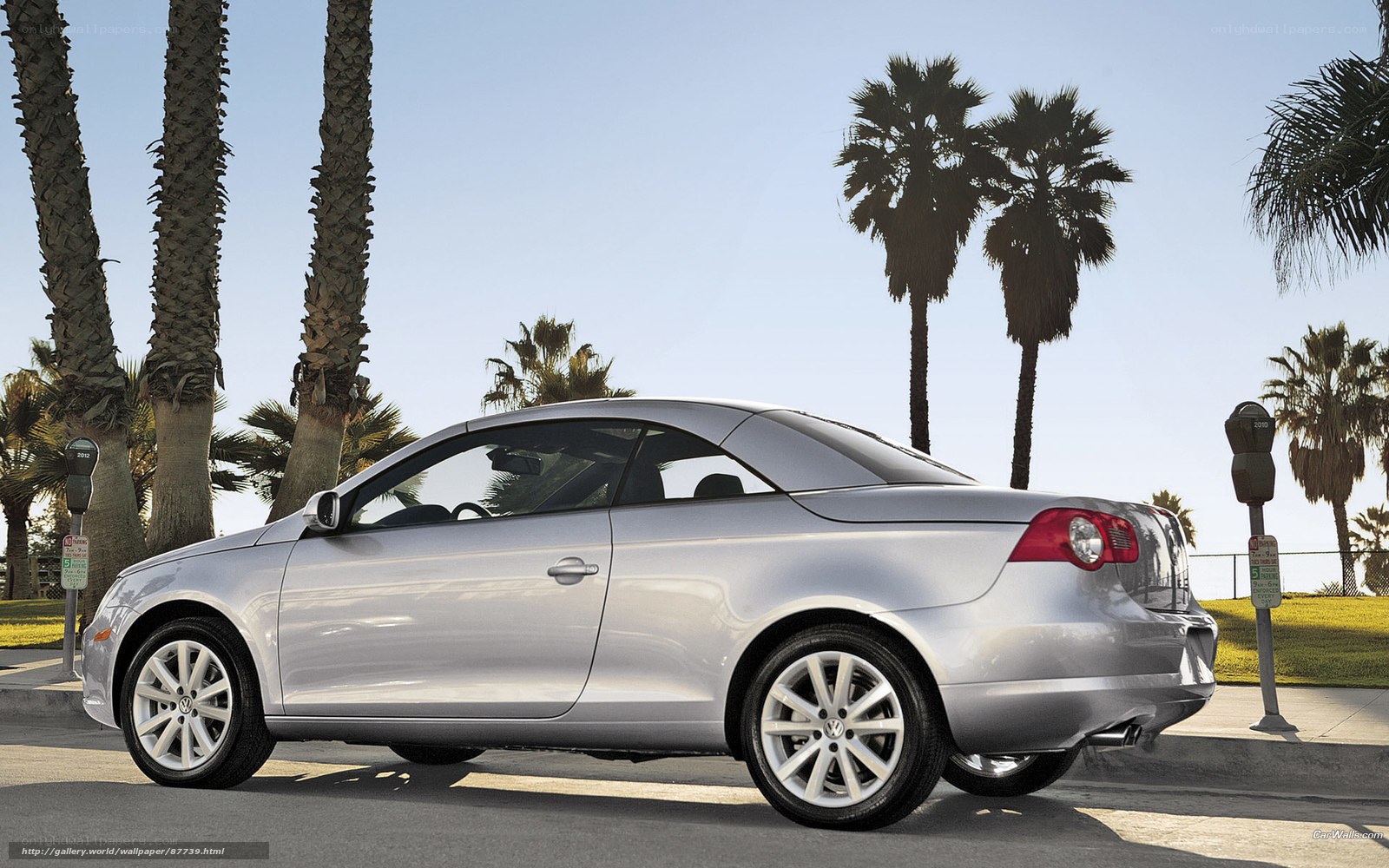 Silver convertible on a sunny day