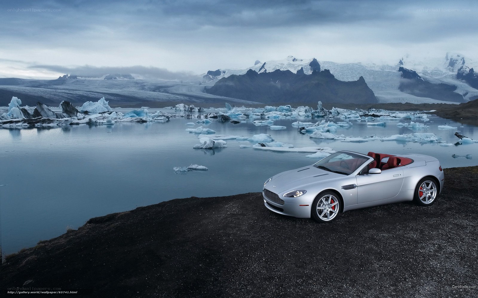 Silver convertible on glacier lagoon