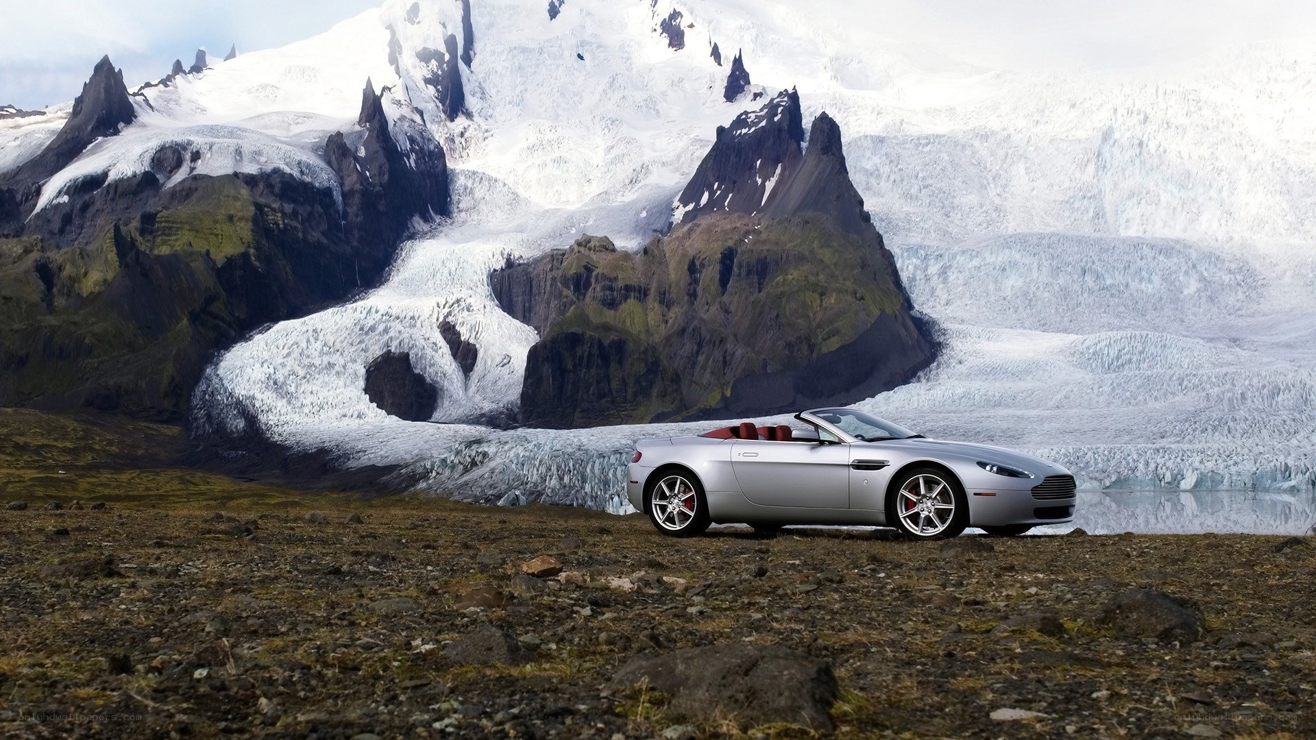 Silver convertible on glacier landscape