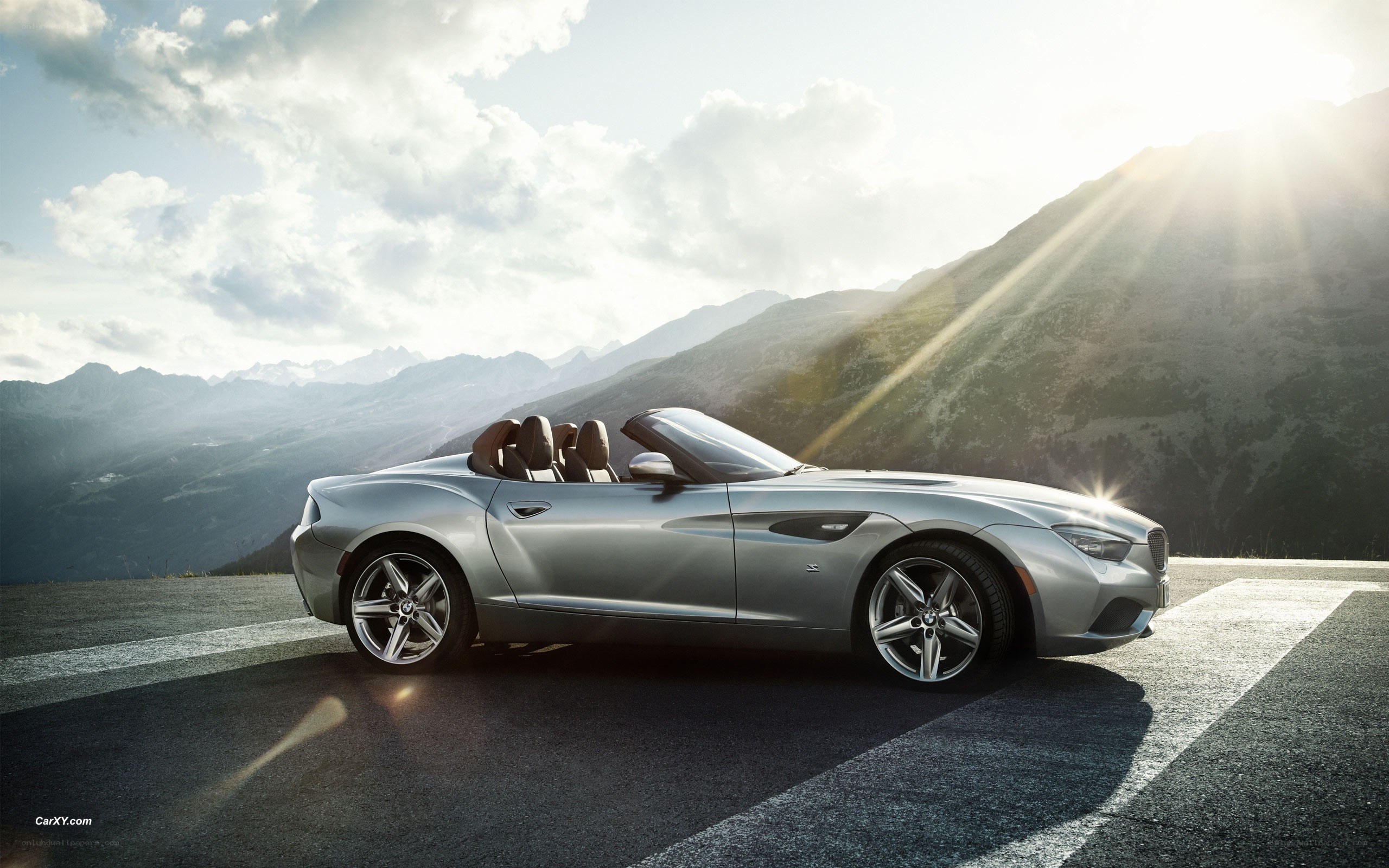 Silver convertible on mountain road