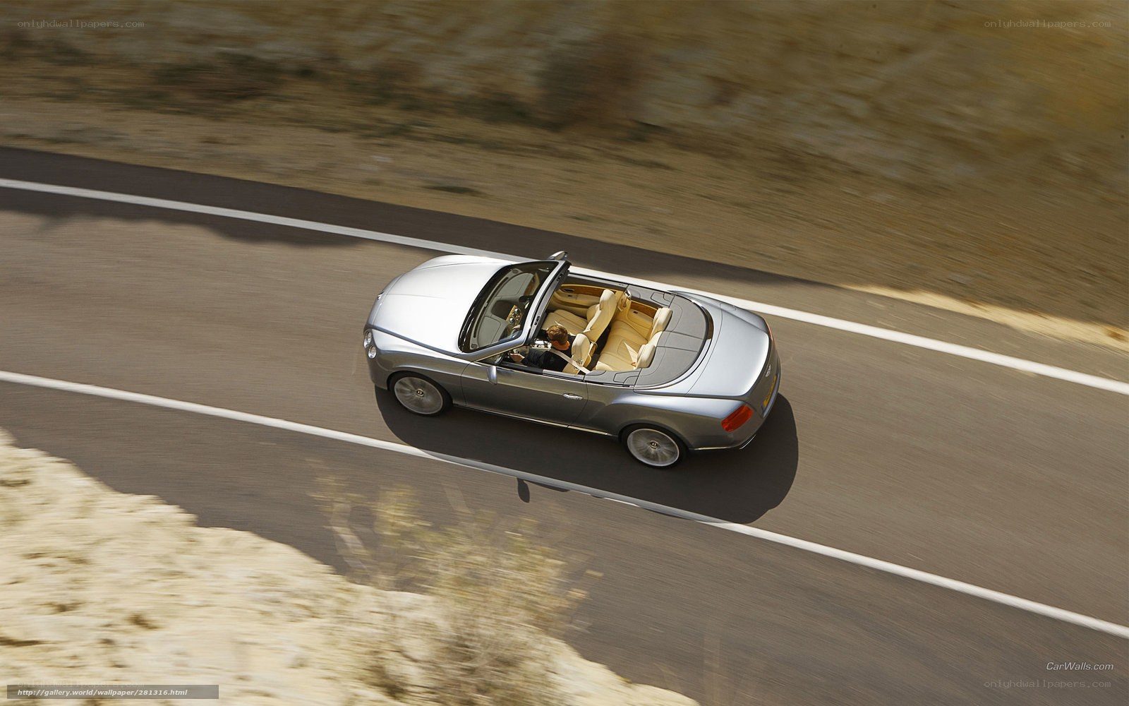 silver convertible on road