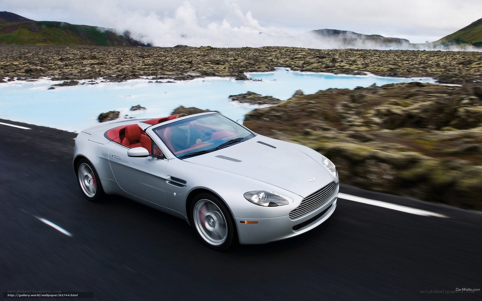 silver convertible on scenic road