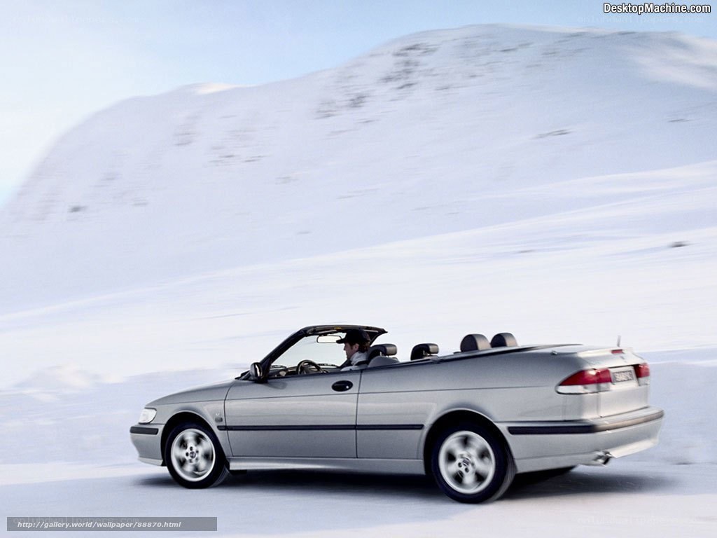 silver convertible on snowy road
