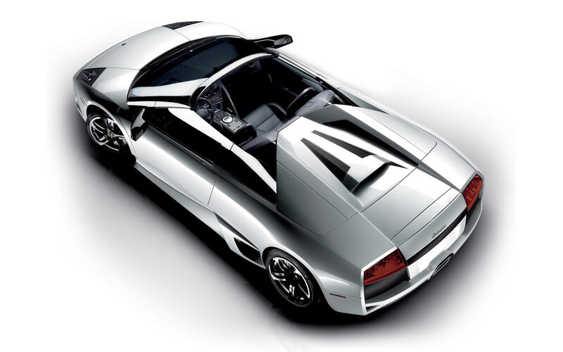 Silver Convertible Sports Car — Dramatic, Photograph, Car Interior, Black Wheels