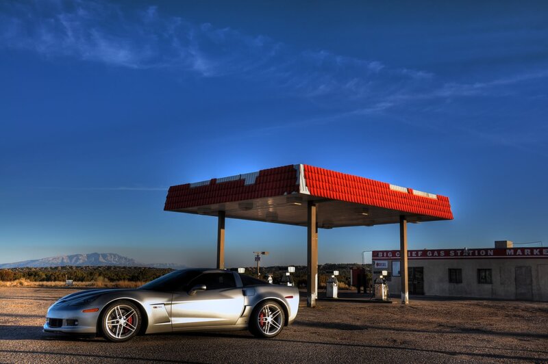 Silver Corvette at Gas Station