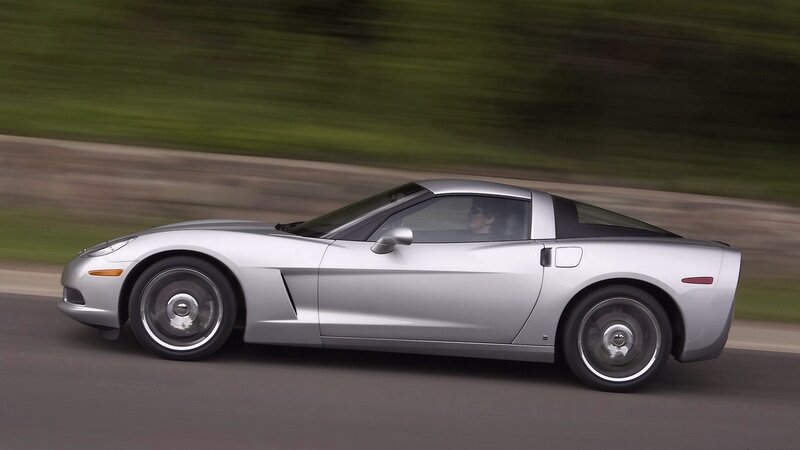 silver corvette in motion