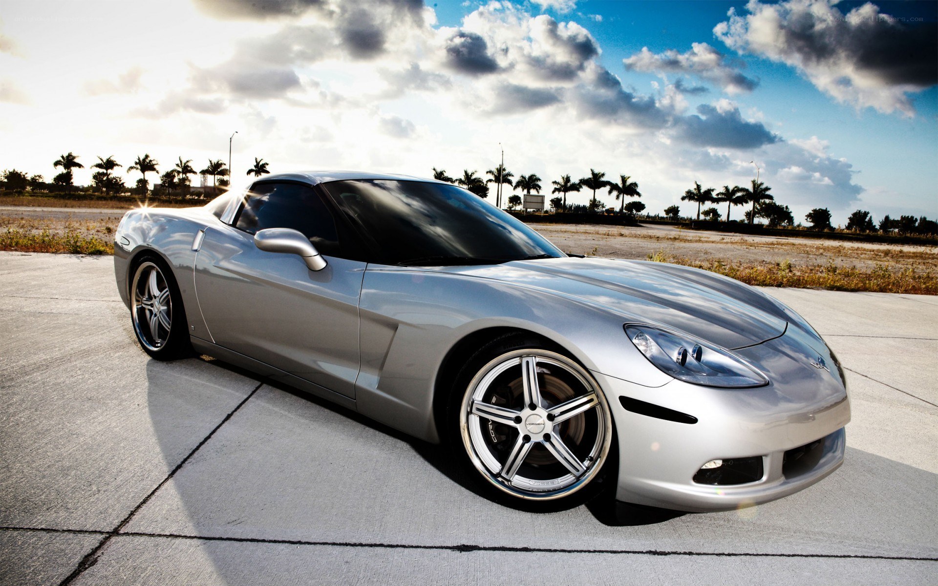 Silver Corvette on a sunny day