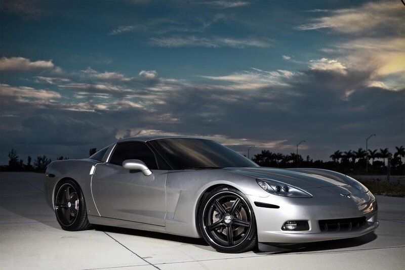 Silver Corvette on a tarmac