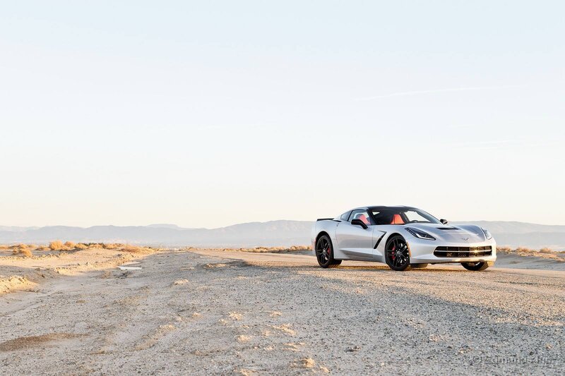 Silver Corvette on Desert Road