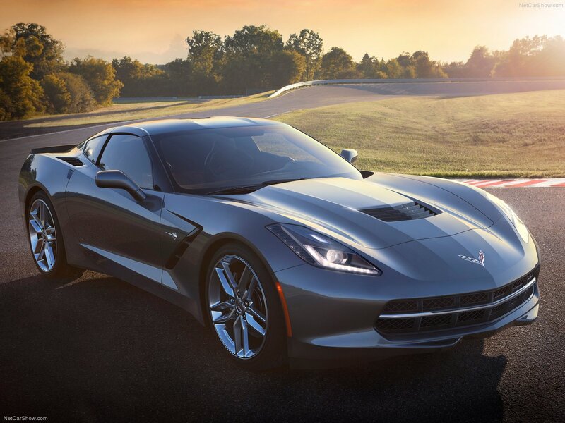 Silver Corvette on Racetrack