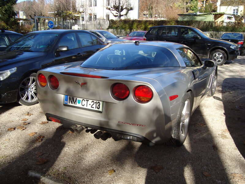 Silver Corvette parked in lot