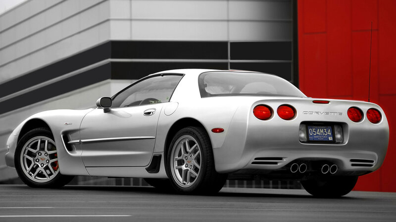 Silver Corvette Sports Car — Dramatic, Photograph, Building, License Plate