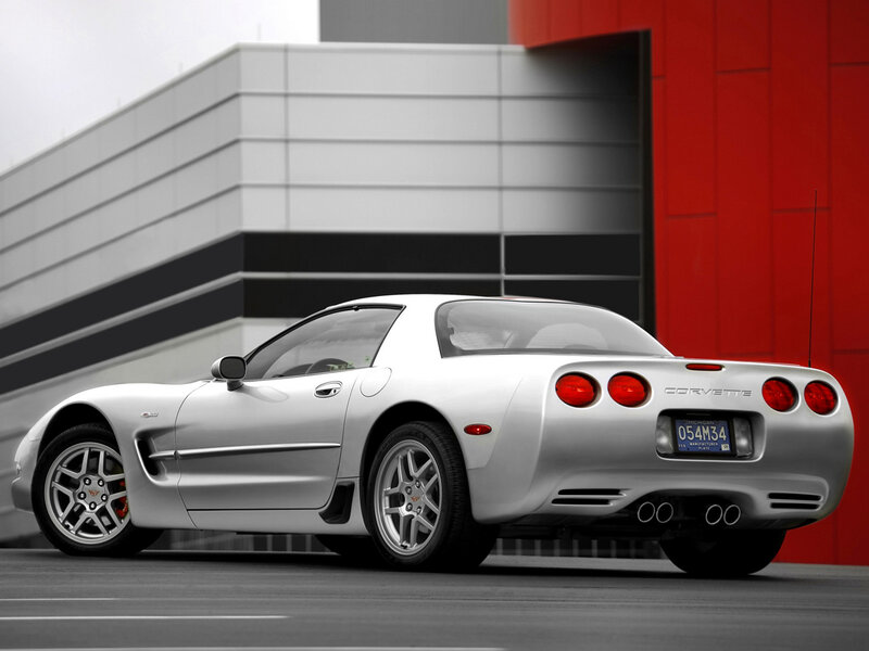 Silver Corvette Sports Car — Dramatic, Photograph, Building