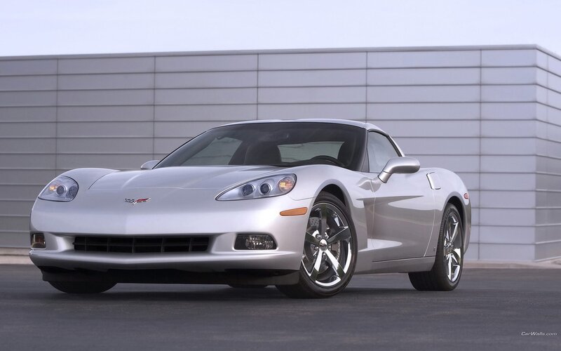 Silver Corvette Sports Car — Neutral, Afternoon, Photograph, Building