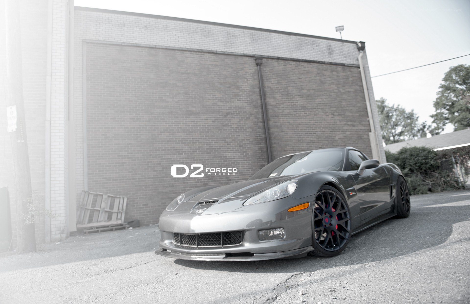 Silver Corvette with custom wheels