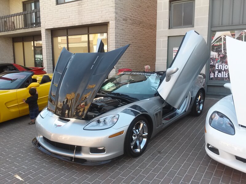 Silver Corvette with Doors Open