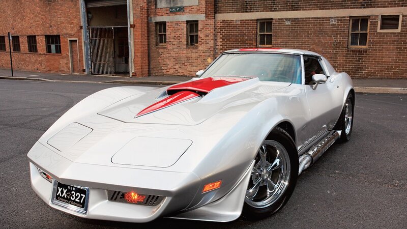 silver corvette with red accents