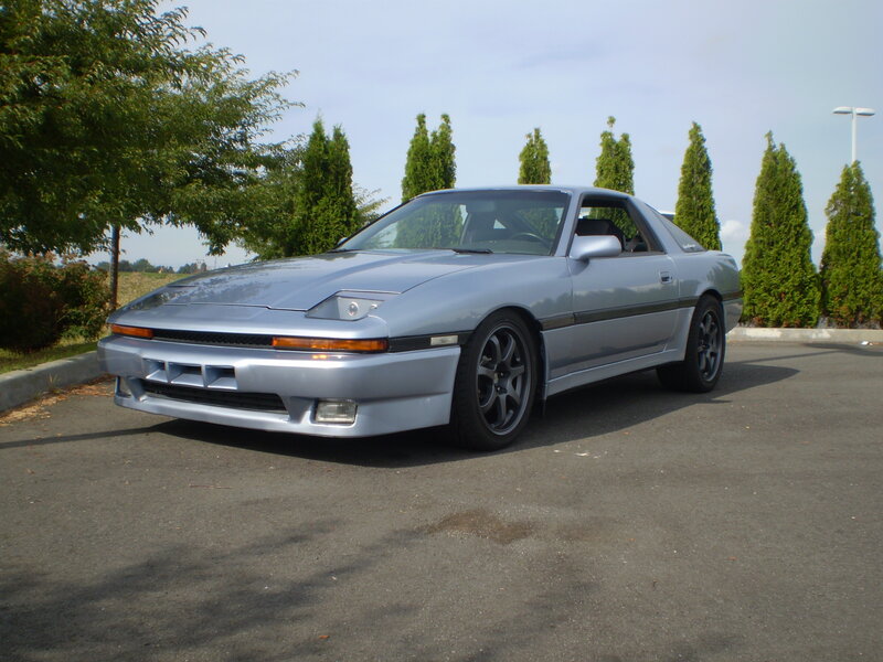 Silver Coupe Car — Calm