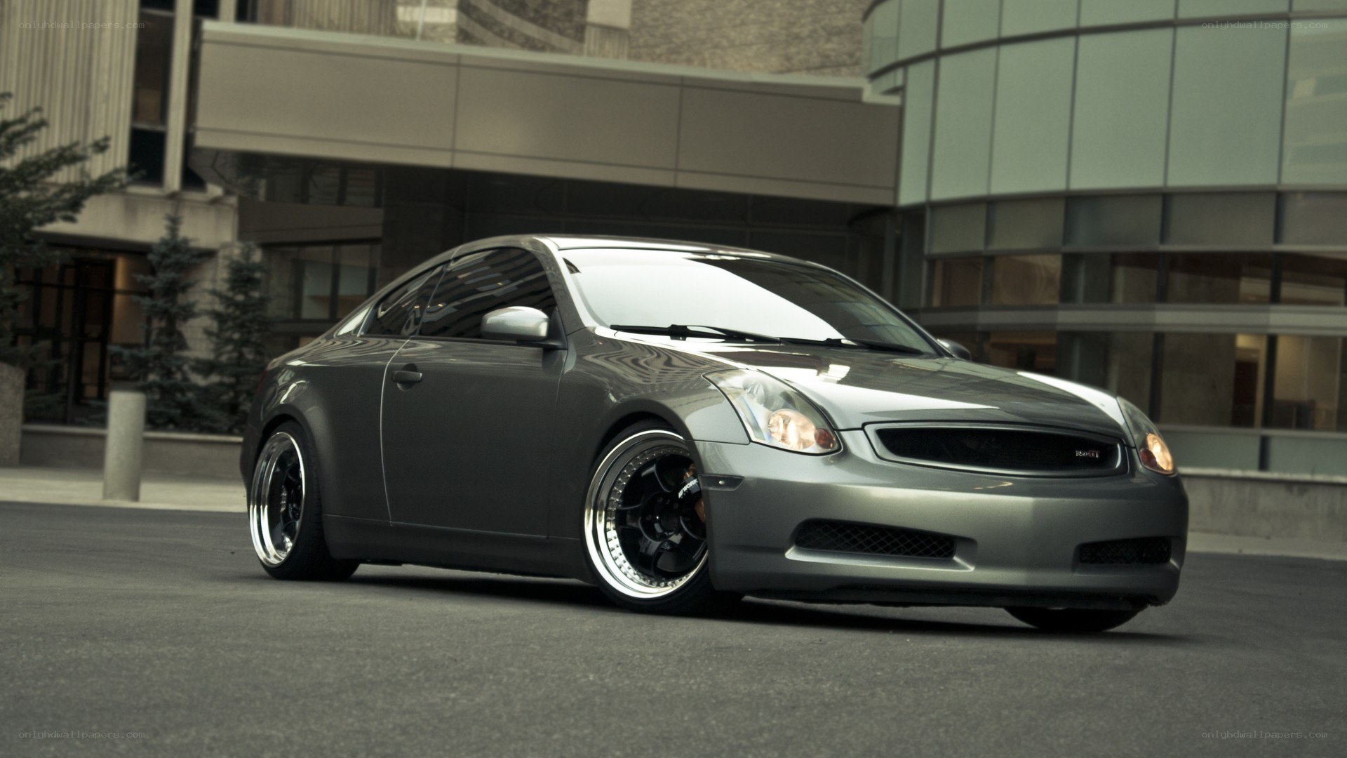silver coupe car in city