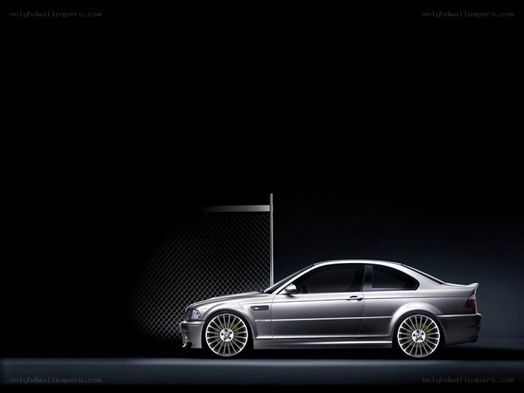 silver coupe car in dark studio