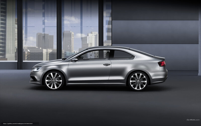 silver coupe car in showroom