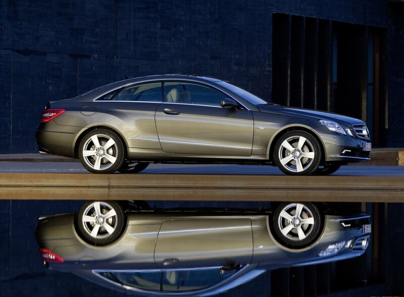 silver coupe car reflection