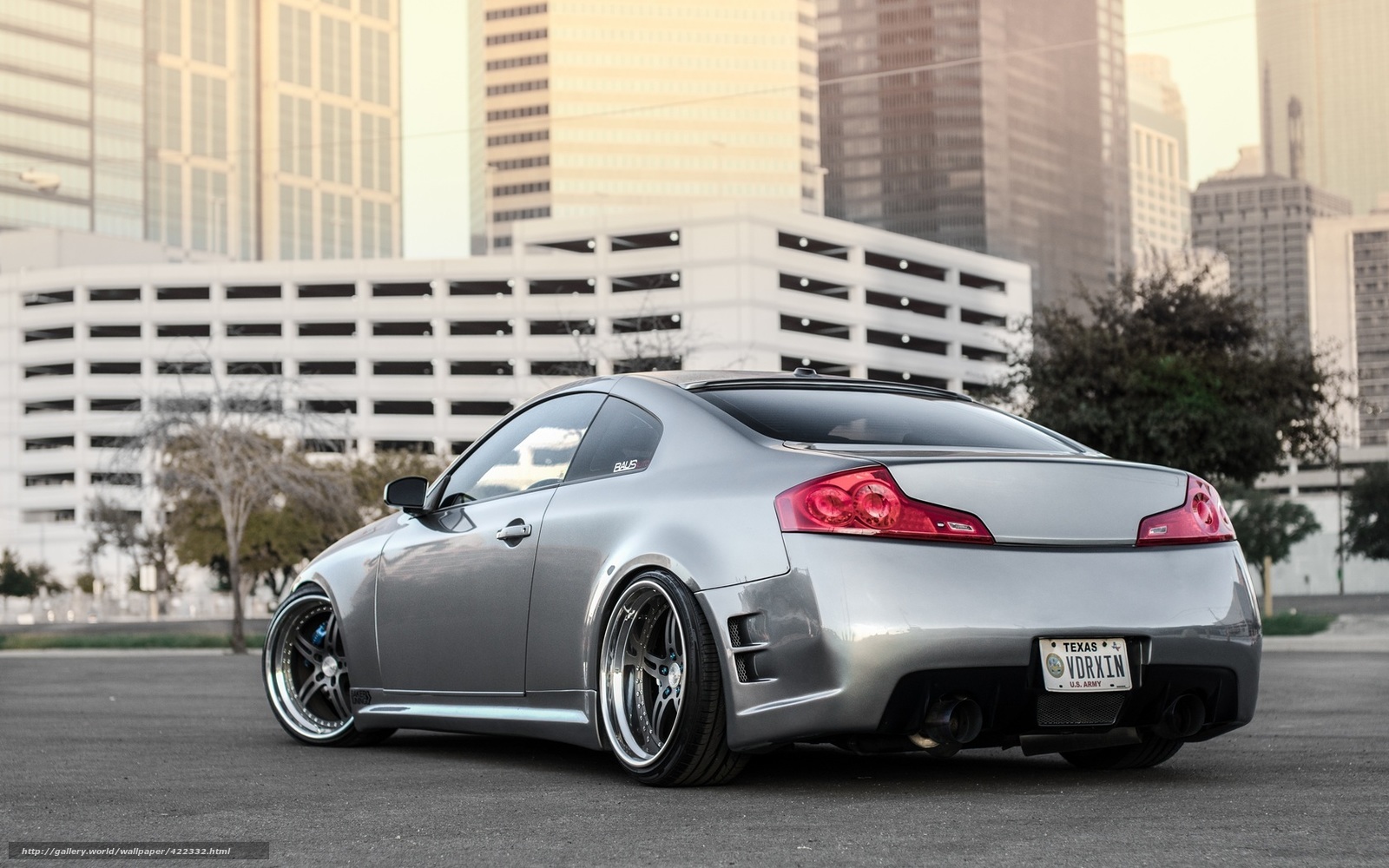 silver coupe in city