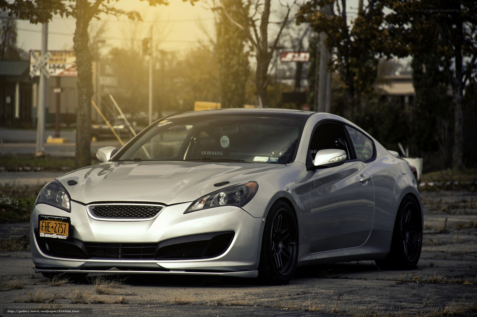 silver coupe in golden light