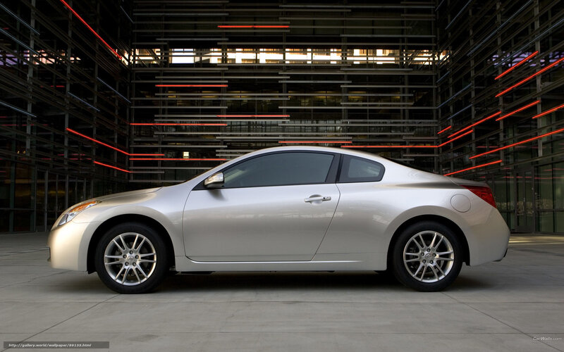 silver coupe in modern setting