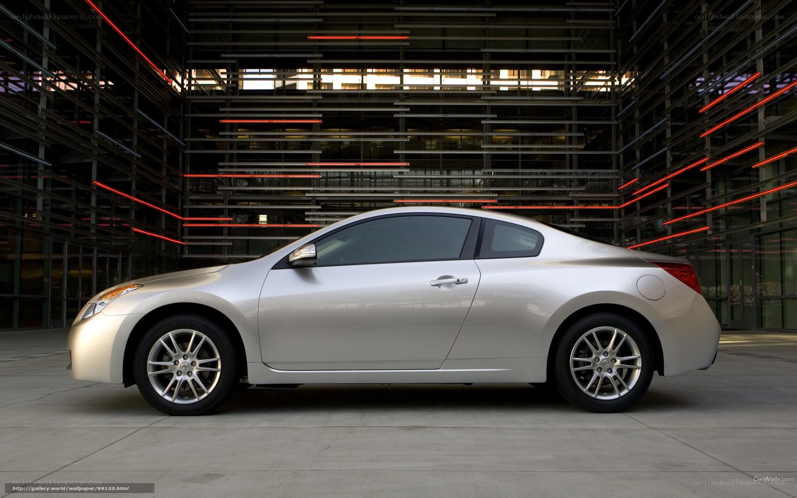 silver coupe in modern setting