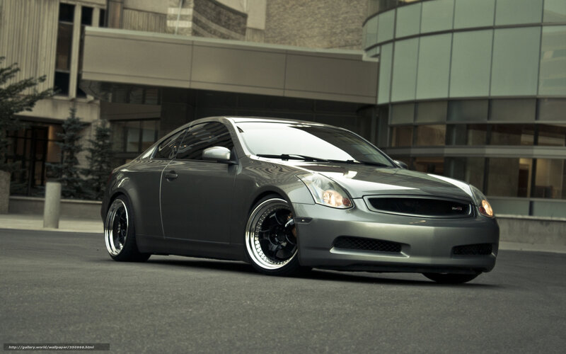 silver coupe in urban setting