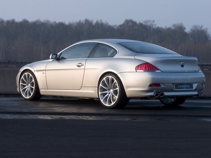 silver coupe on a road