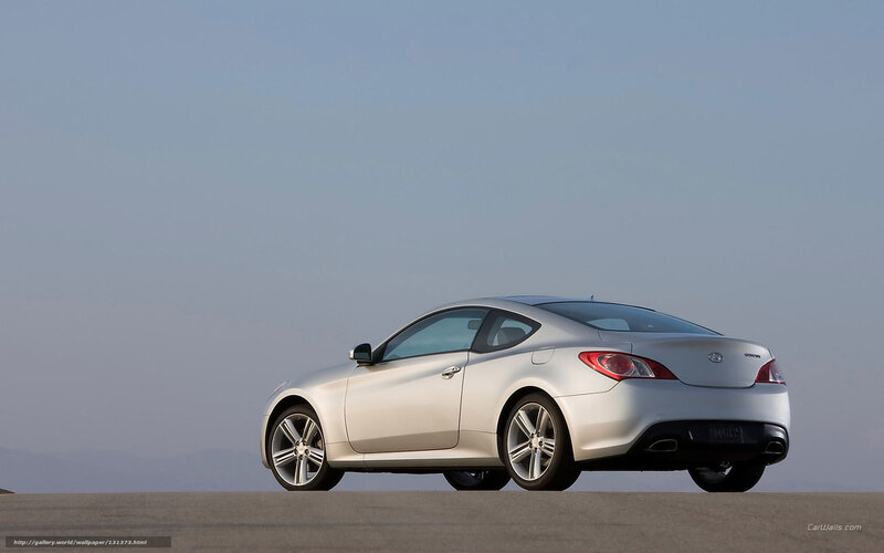 silver coupe on open road