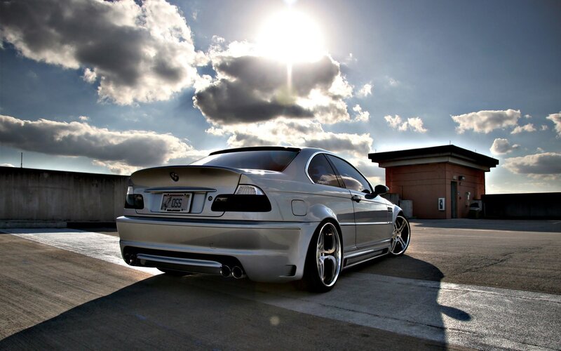 silver coupe on rooftop