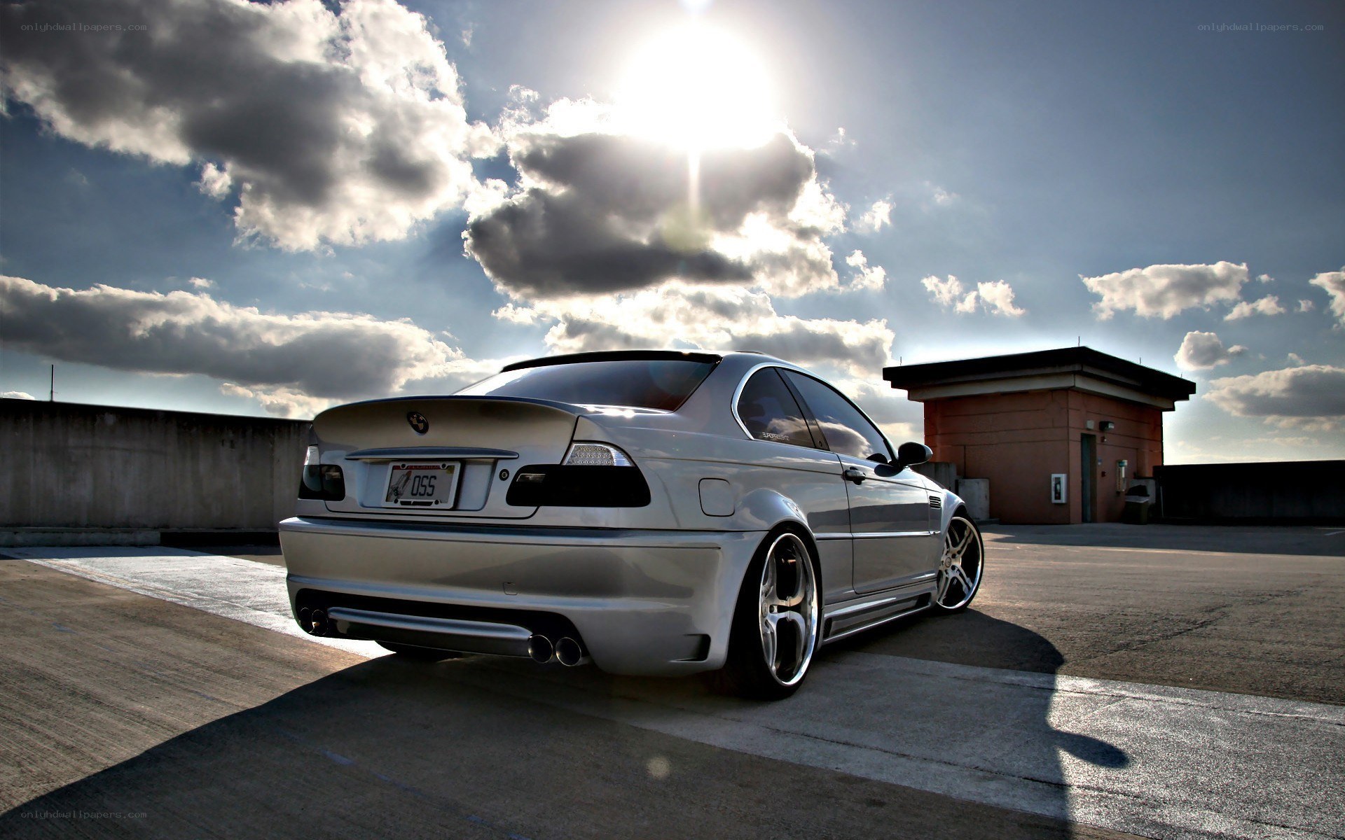 silver coupe on rooftop