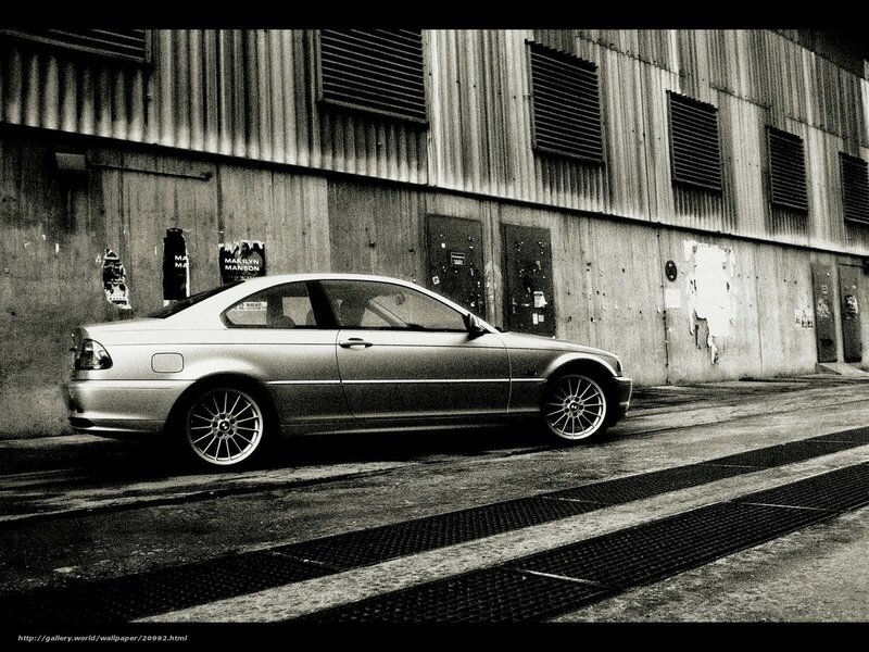 silver coupe parked in alley