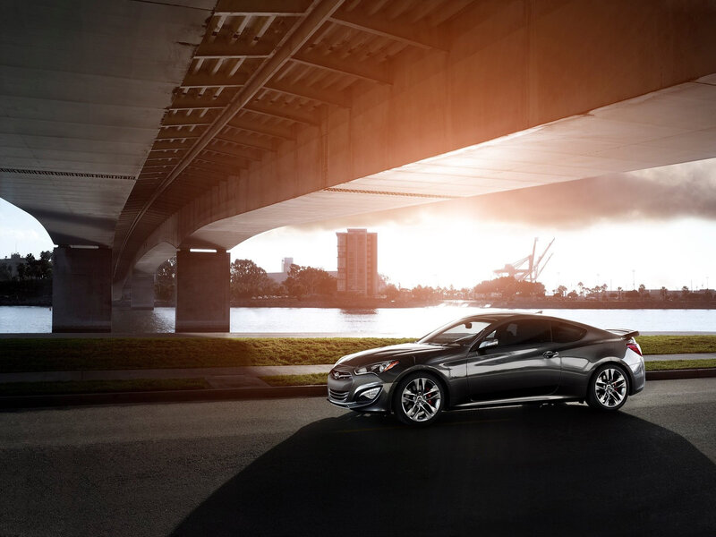 Silver Coupe under Bridge