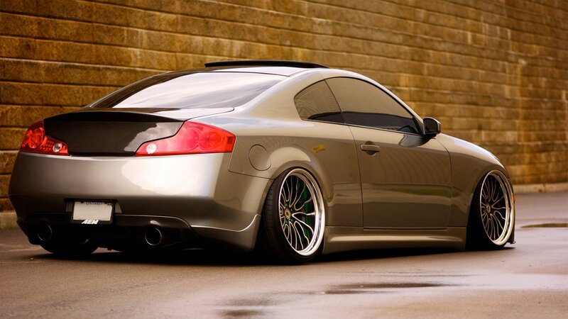 silver coupe with custom wheels