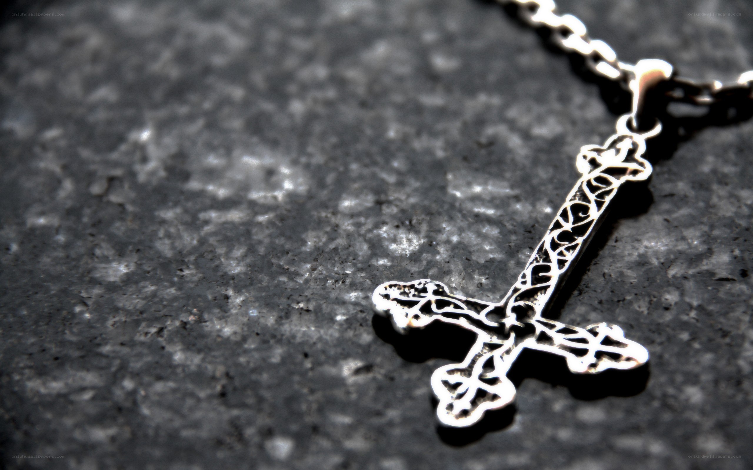 silver cross pendant on chain