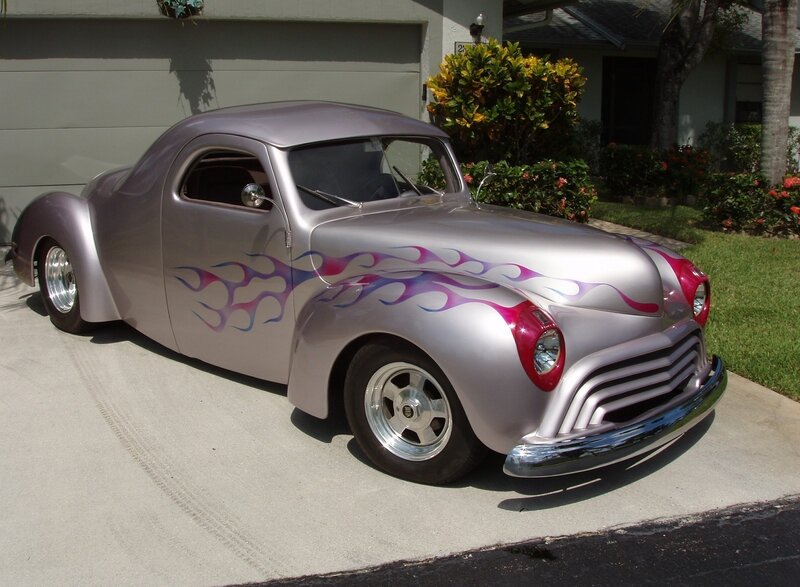 silver custom car with flames