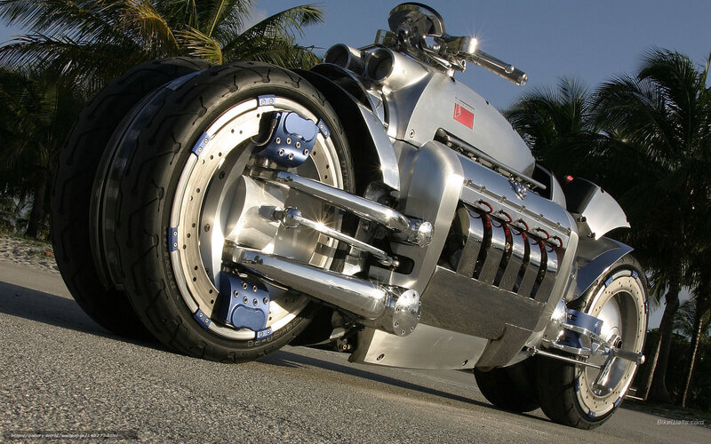 Silver custom motorcycle on beach