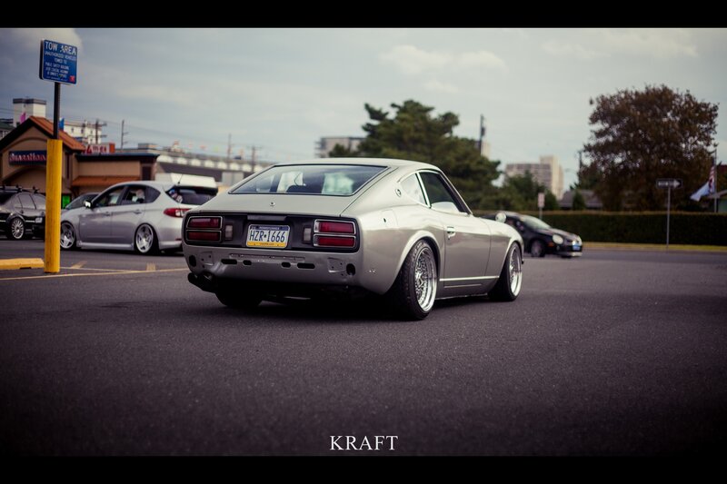 Silver Datsun 240Z in parking lot