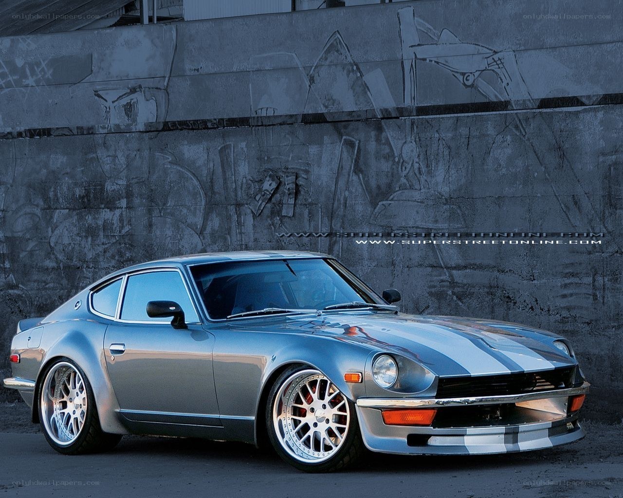 silver datsun 240z with stripes