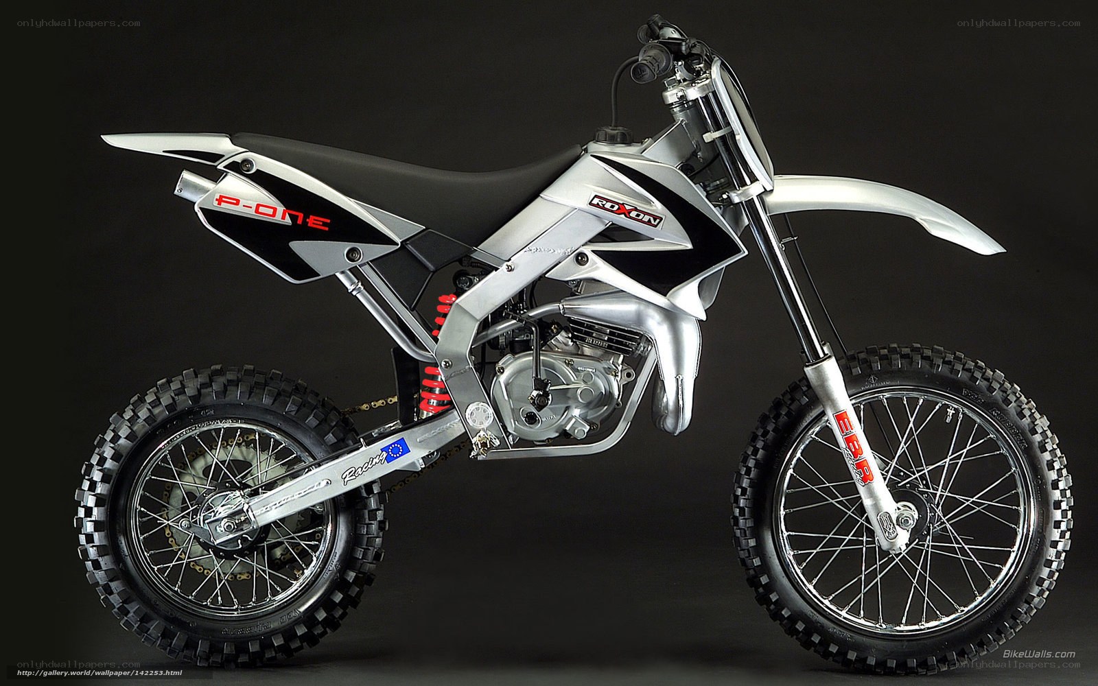 silver dirt bike motorcycle