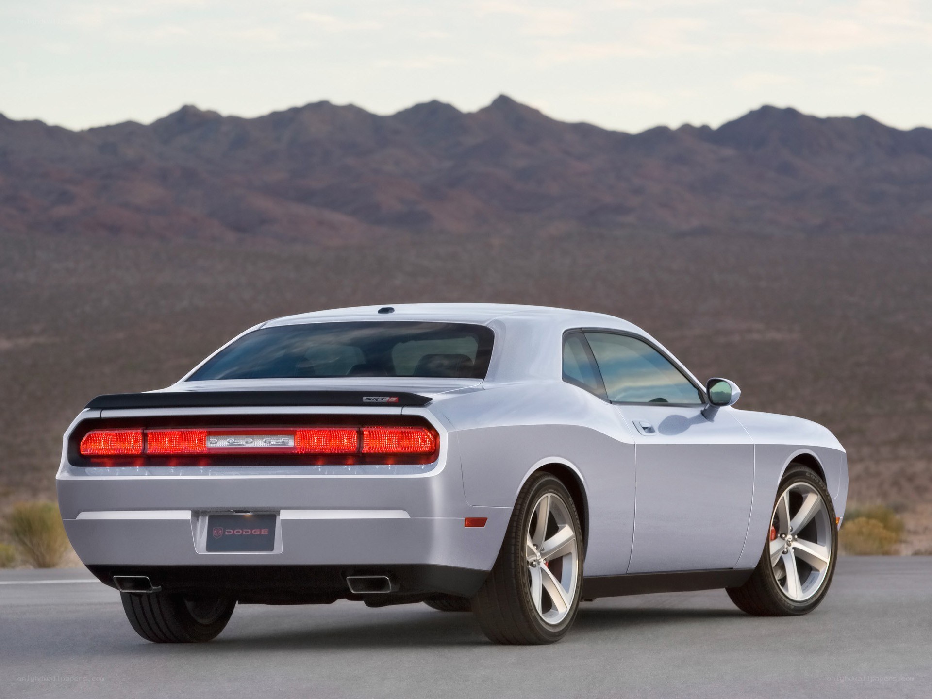 Silver Dodge Challenger in desert