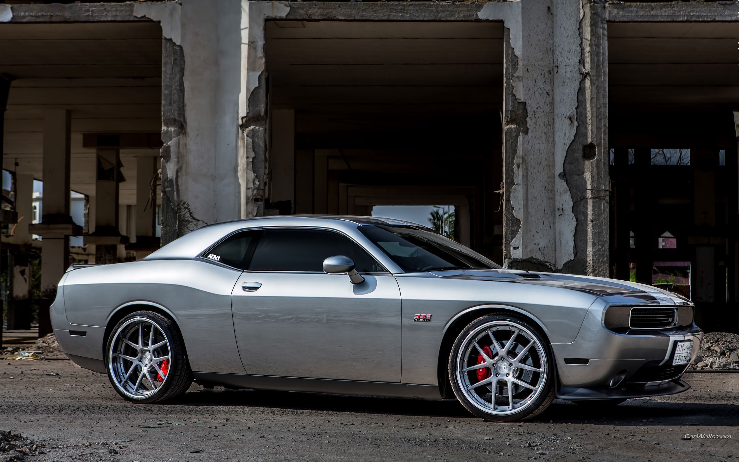 Silver Dodge Challenger in ruins
